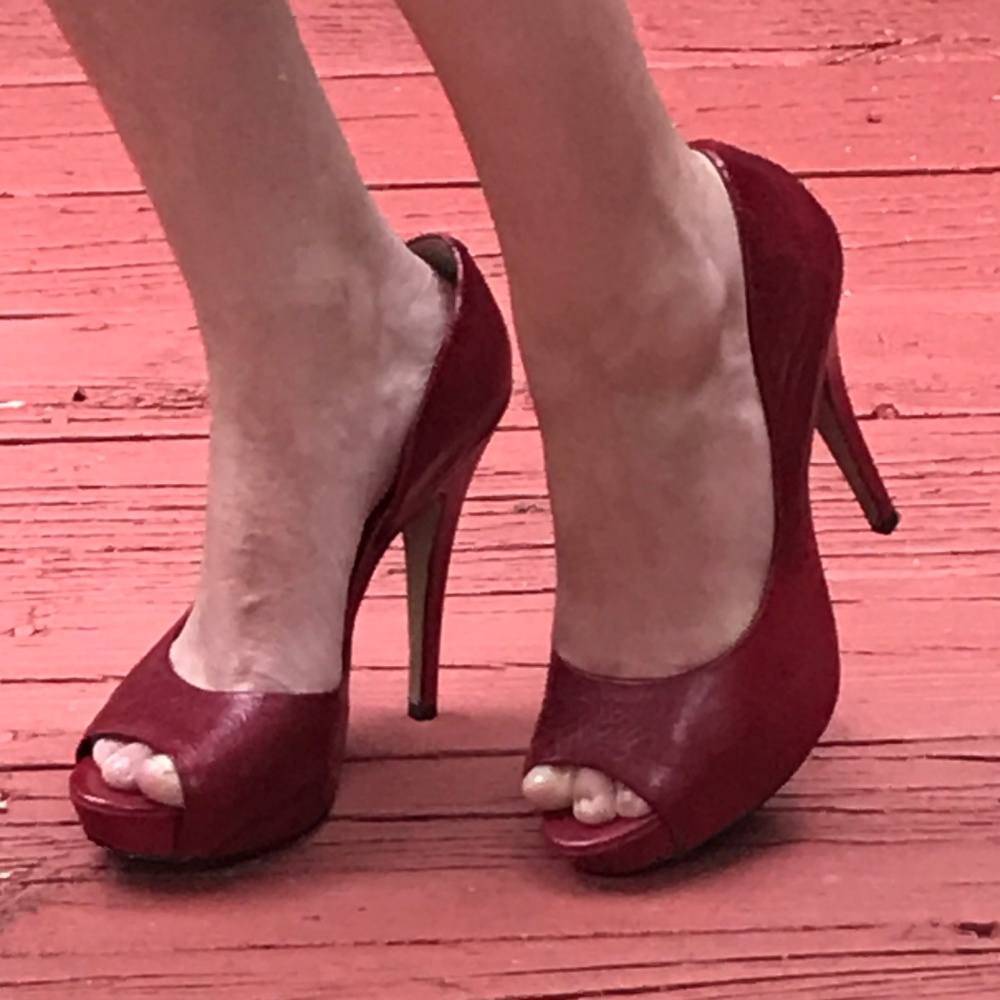 Jessica Simpson red leather peep toe pumps